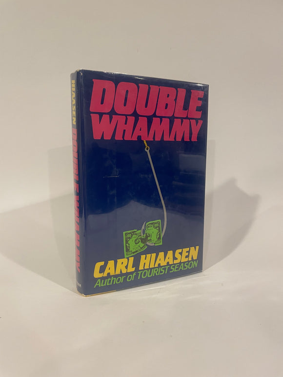 Double Whammy. Carl Hiaasen.